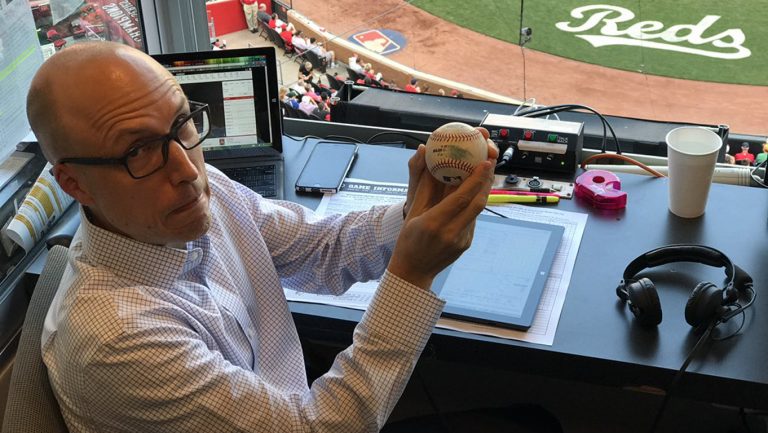 The foul ball caught me in the Cincinnati booth